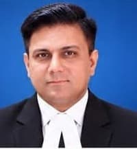 Portrait of Syed Sajid Hussain Shah, Legal Advisor of Muhammadi Foundation.